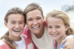 Mom and Daughters Smiling